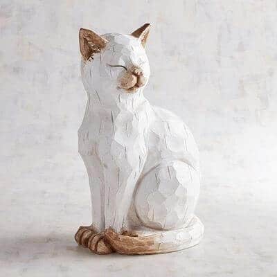 Winking cat sculpture