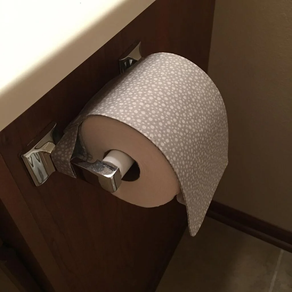 Cat proof toilet paper guard